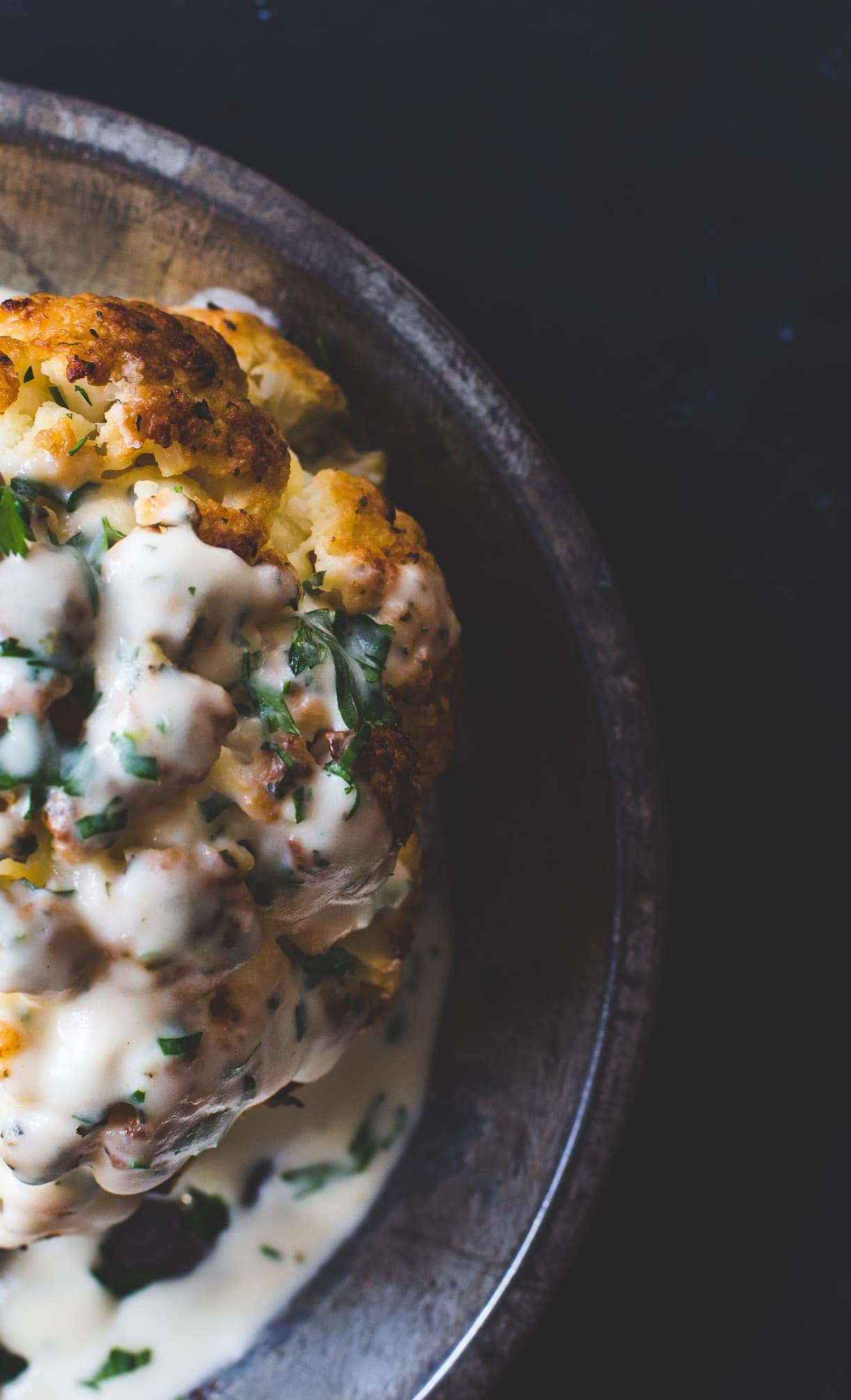 Incredible Whole Roasted Cauliflower with Cheese Sauce