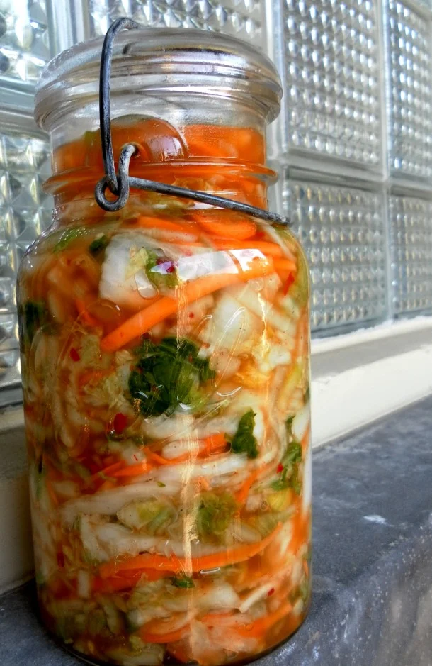 kimchi in tall glass jar