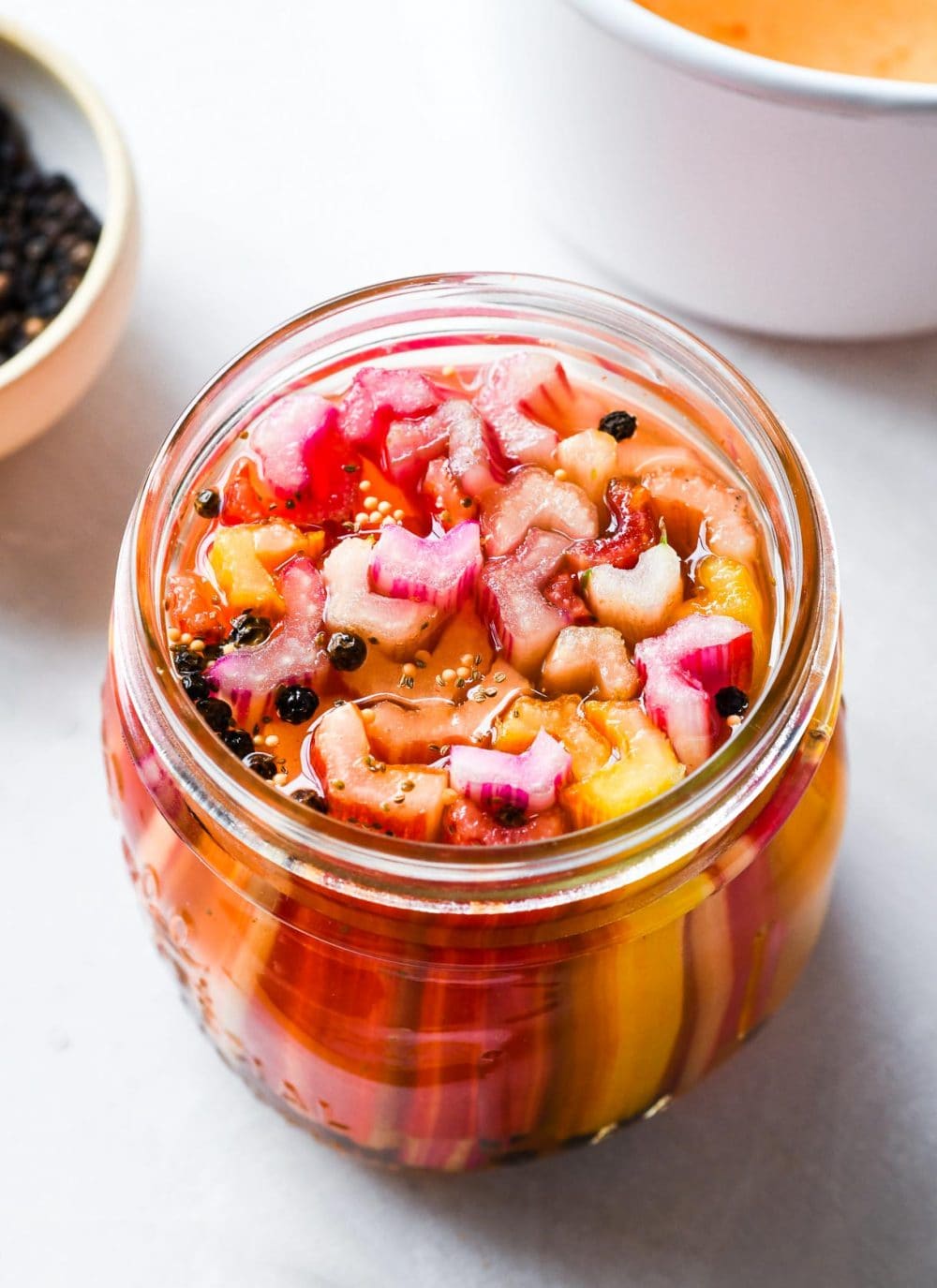 pickled swiss chard stems in a clear mason jar