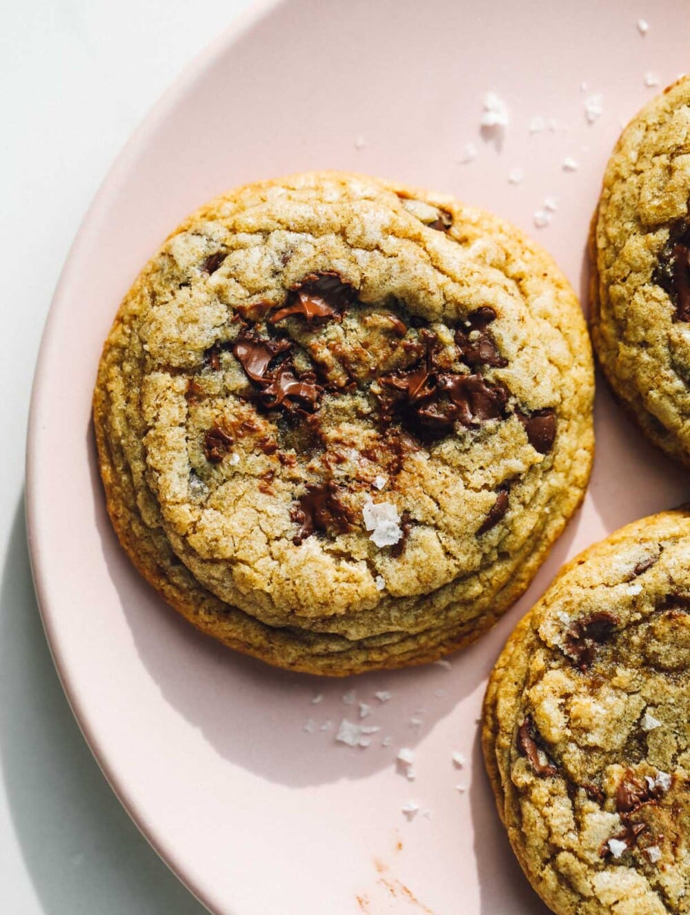 gluten-free chocolate chip cookies on pink plate