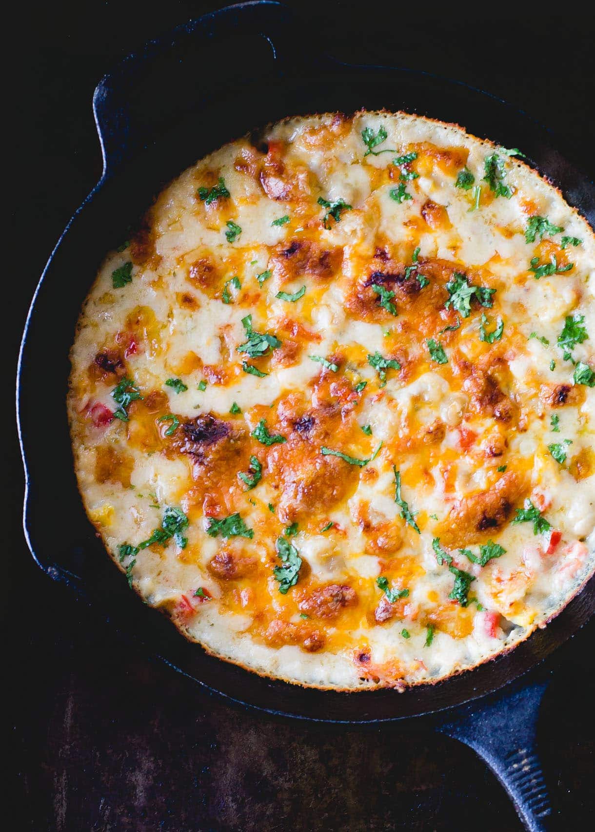 Skillet White Chicken Chili Dip ~ hot and cheesy, in a cast iron skillet. {gluten-free}