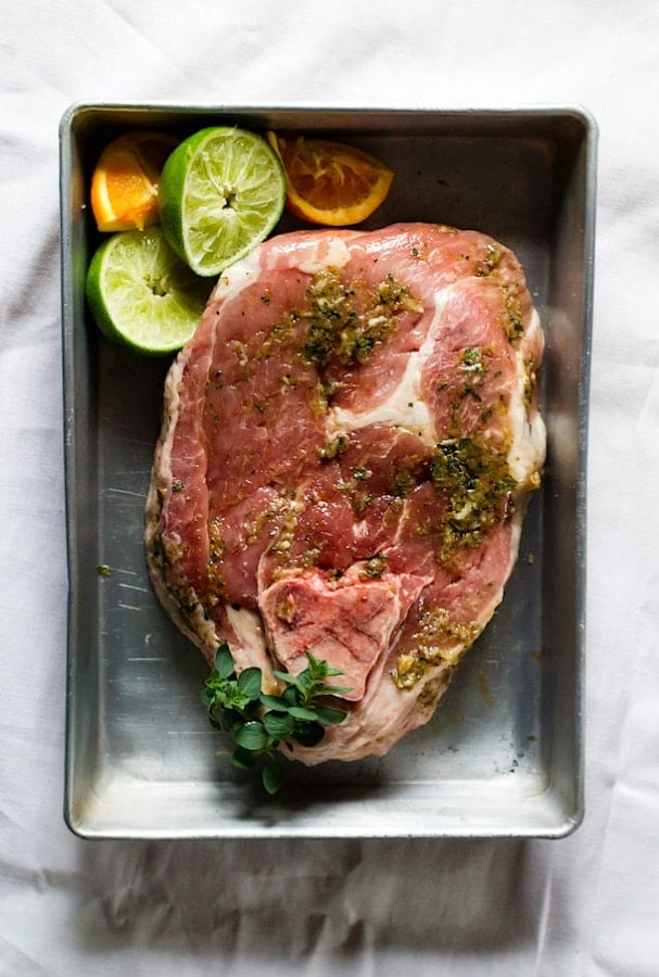 uncured ham steak marinating in a pan