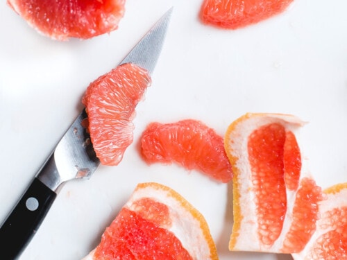 grapefruit segment on a knife