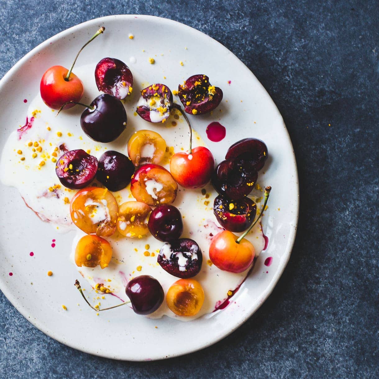 Cherries Floating in Vanilla Cream with Bee Pollen Sprinkles
