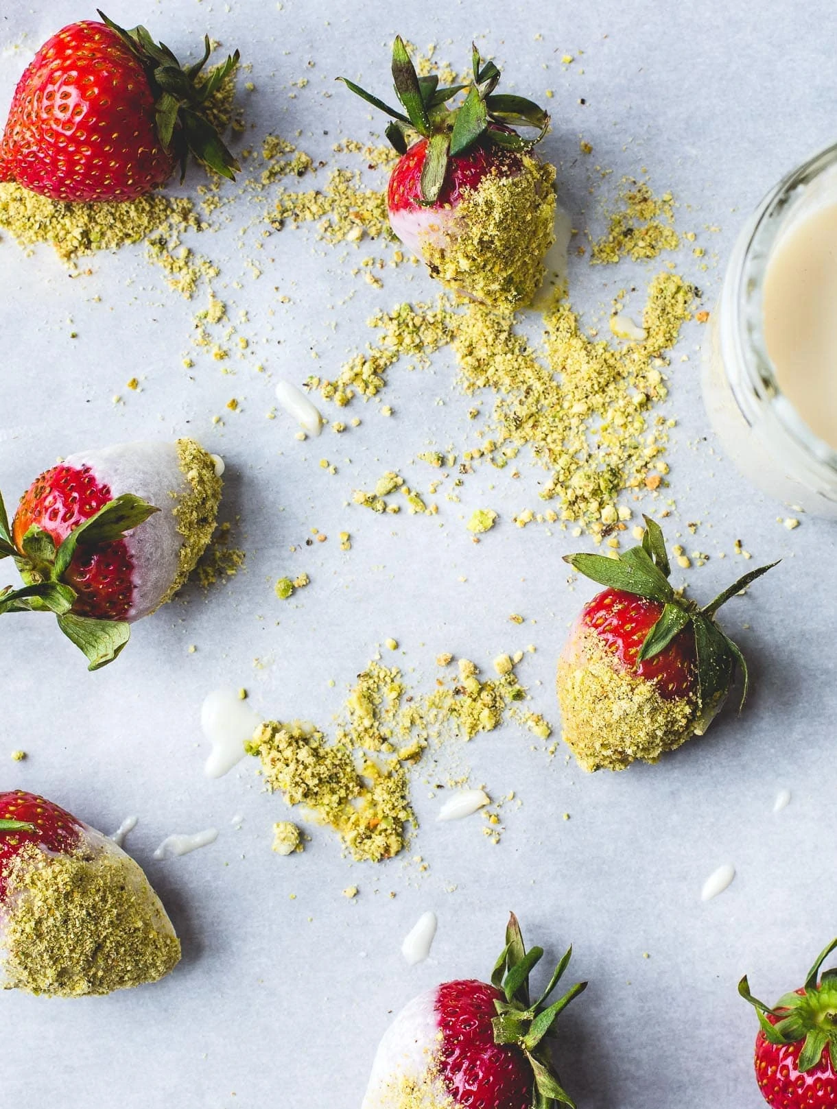 Vegan Coconut Butter Dipped Strawberries with Pistachio Dust
