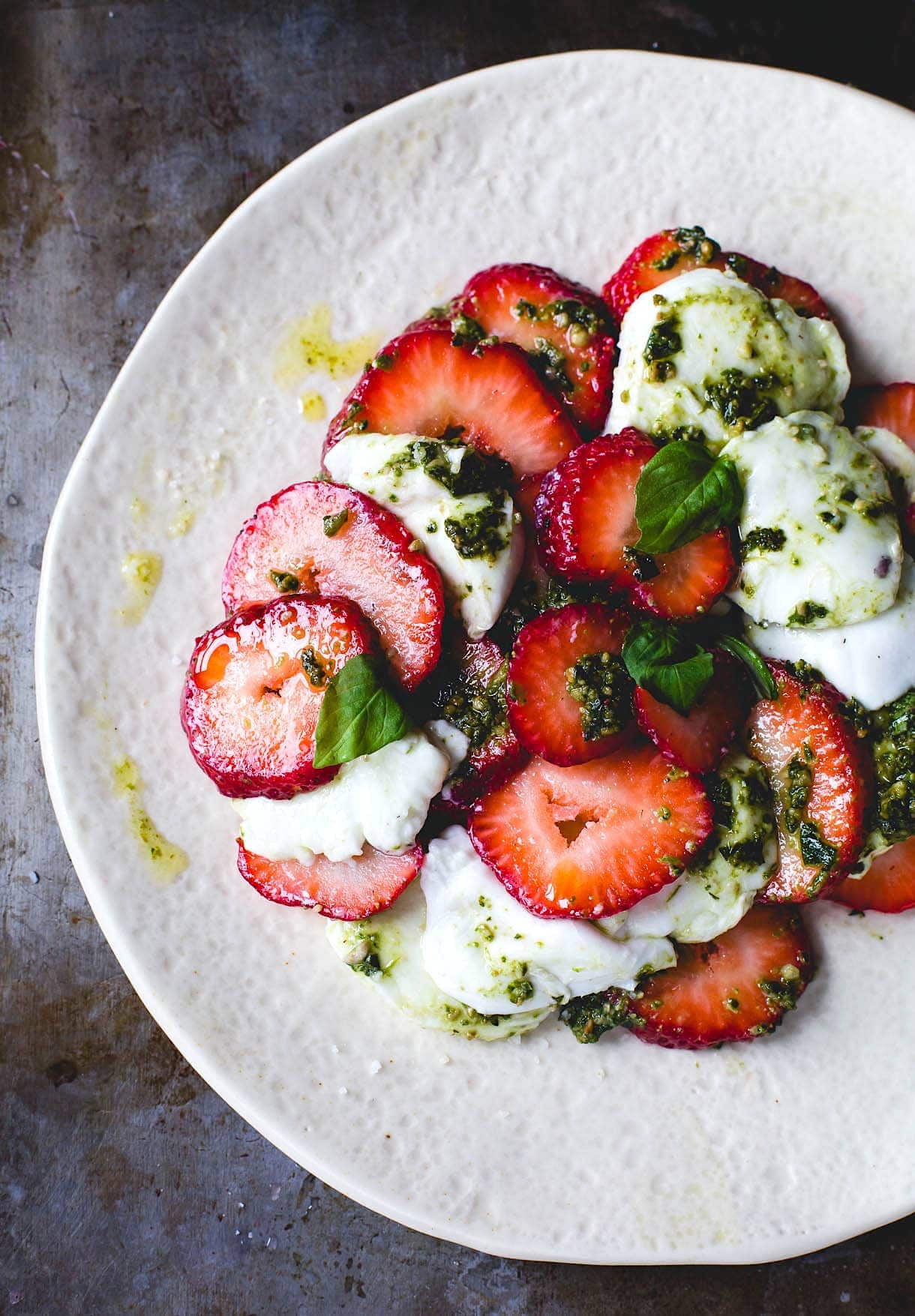 Pesto Strawberry Caprese Salad on a plate