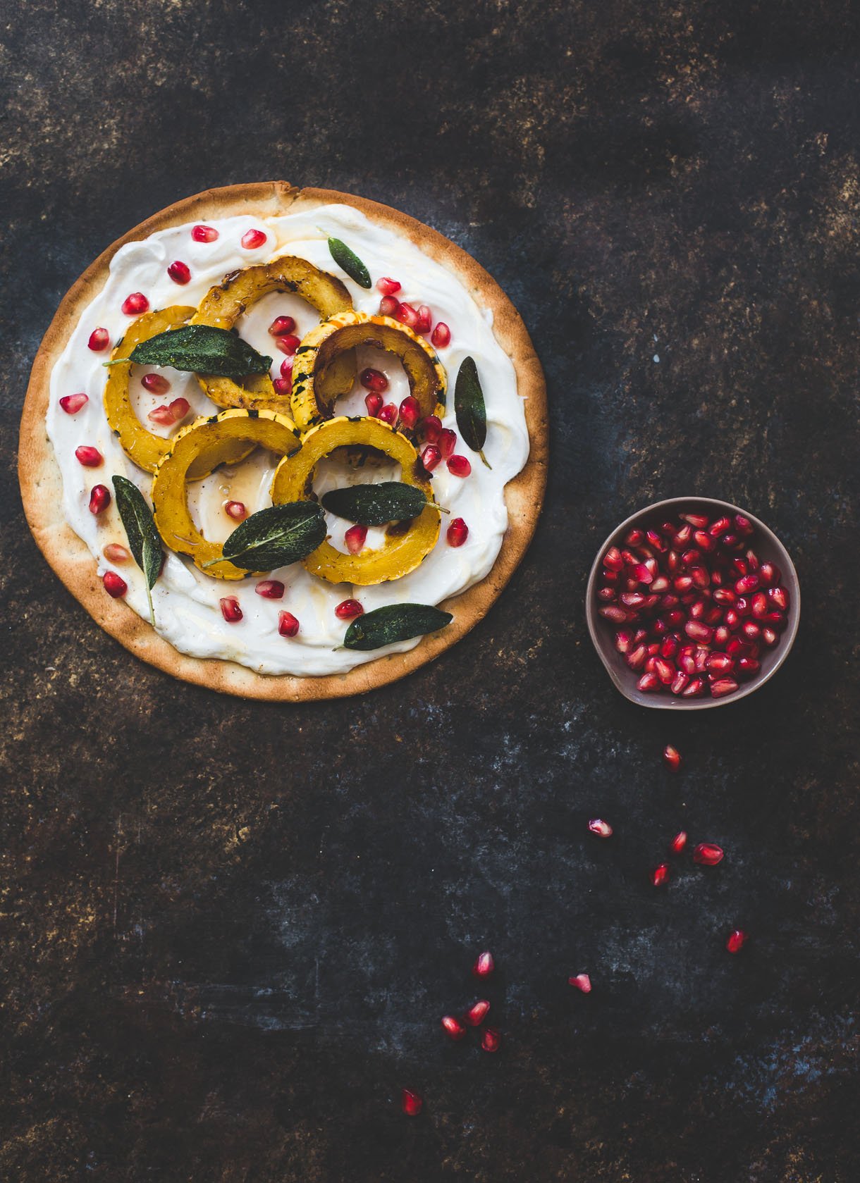 Sweet Delicata Pizza with Fried Sage, Pomegrante, and Honey Yogurt