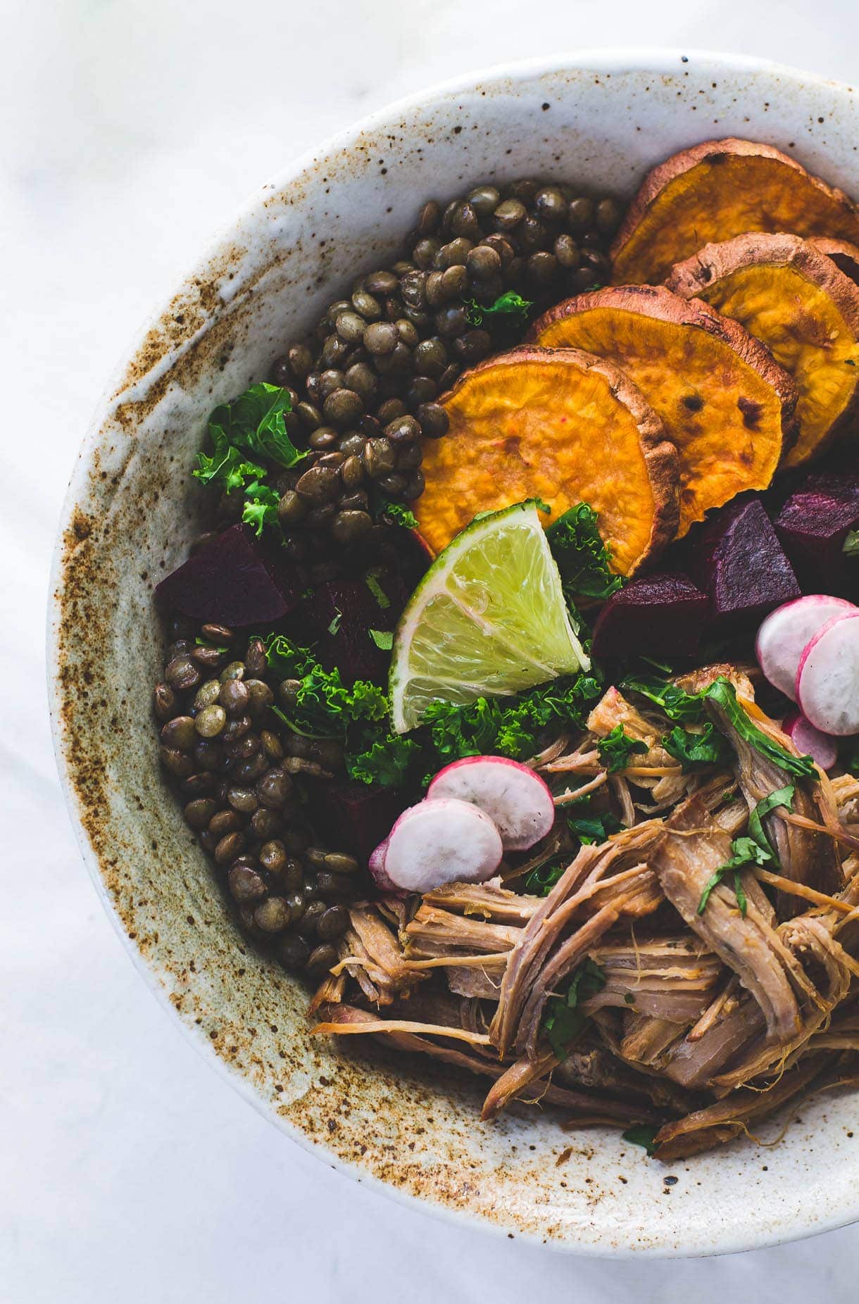 Wholesome, Colorful Lentil Bowls: with roasted vegetables, steamed kale, and pork