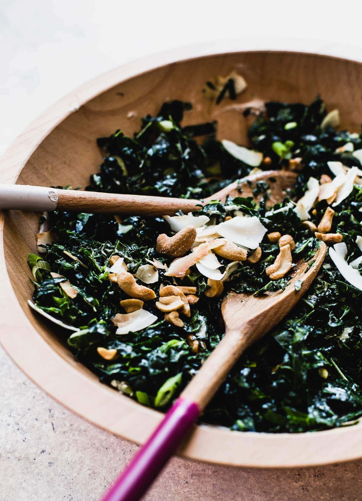 Coconut Cashew Kale Salad {massaged kale meets toasted coconut flakes & salty cashews}