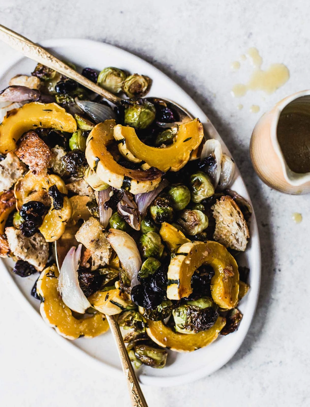 Vegetarian Sheet Pan Stuffing with squash, brussels sprouts, and dried tart cherries