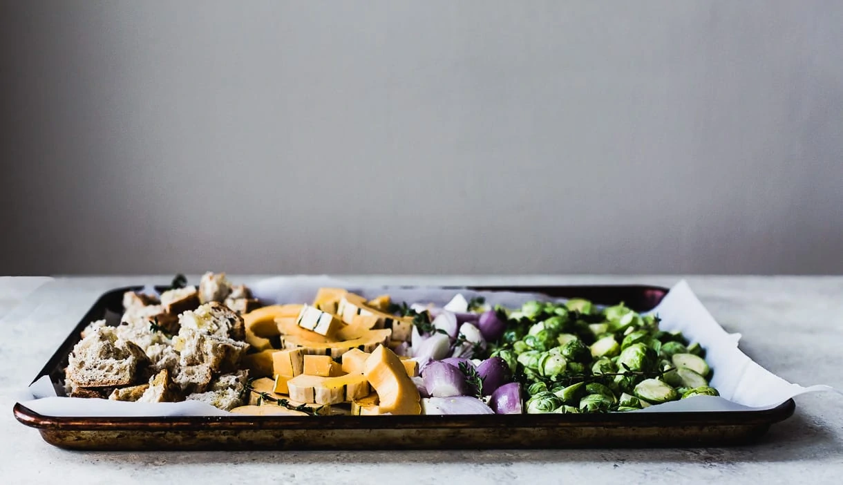 Vegetarian Sheet Pan Stuffing with squash, brussels sprouts, and shallots