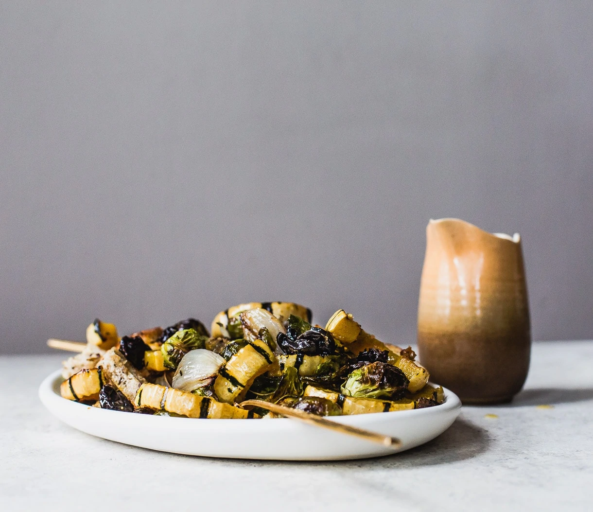 Vegetarian Sheet Pan Stuffing with squash, brussels sprouts, and dried tart cherries