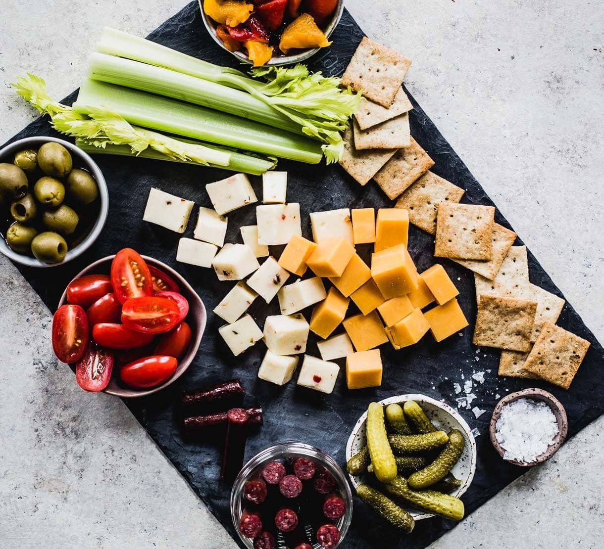 Bloody Mary Appetizer Board (all the fixings you normally love on a bloody mary skewer, made into a cheese board!)