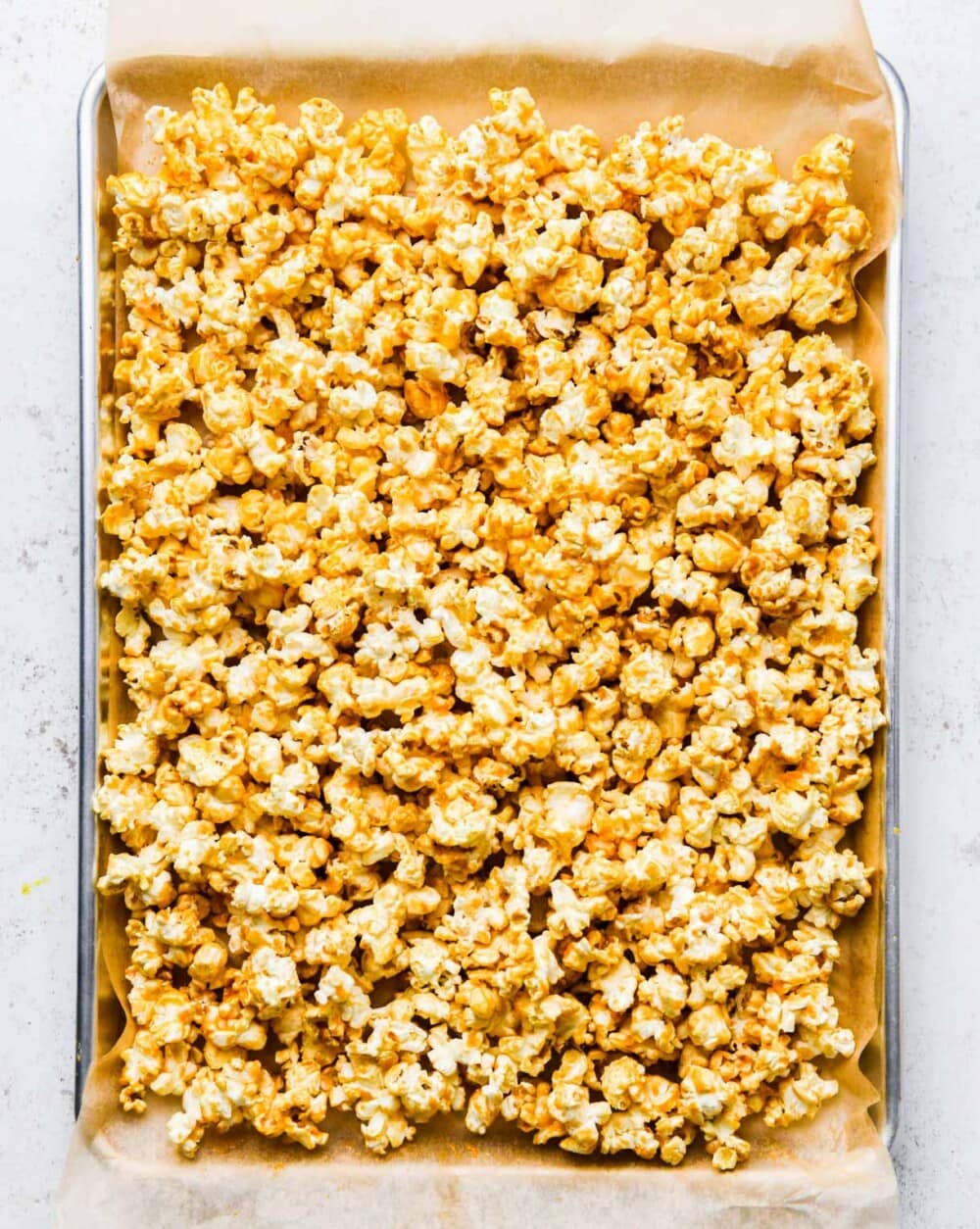 maple caramel corn on a sheet pan