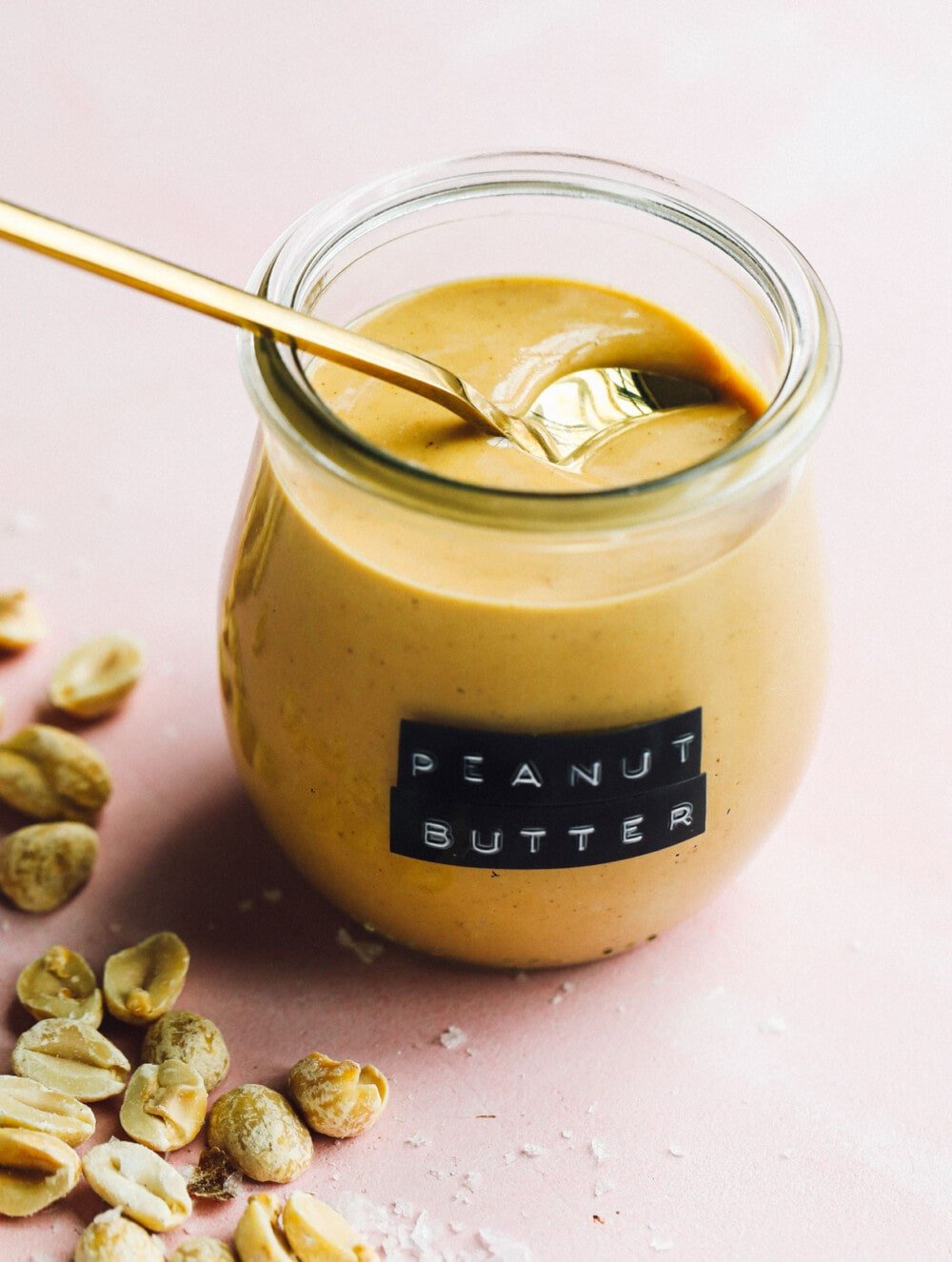 homemade peanut butter in glass jar with label