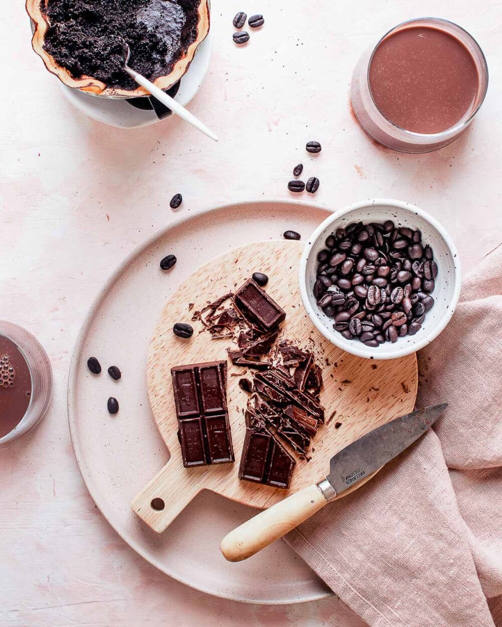 ingredients to make an iced mocha, pink linen in the photo