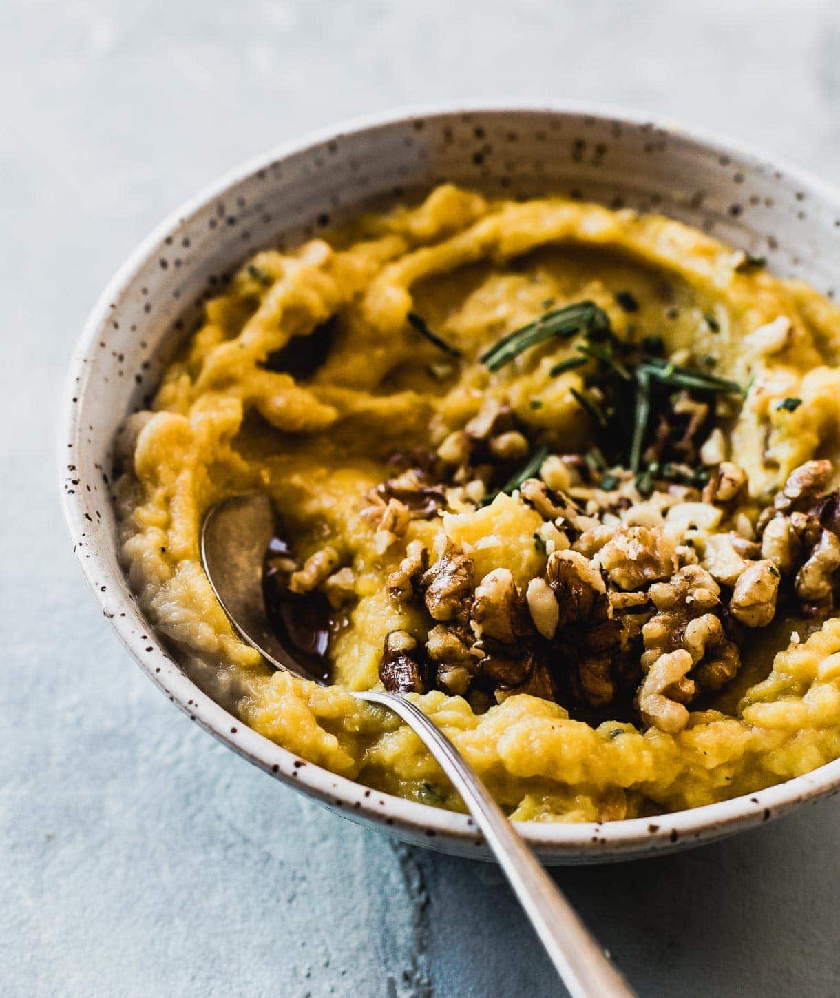 Acorn Squash Puree in a bowl with walnuts