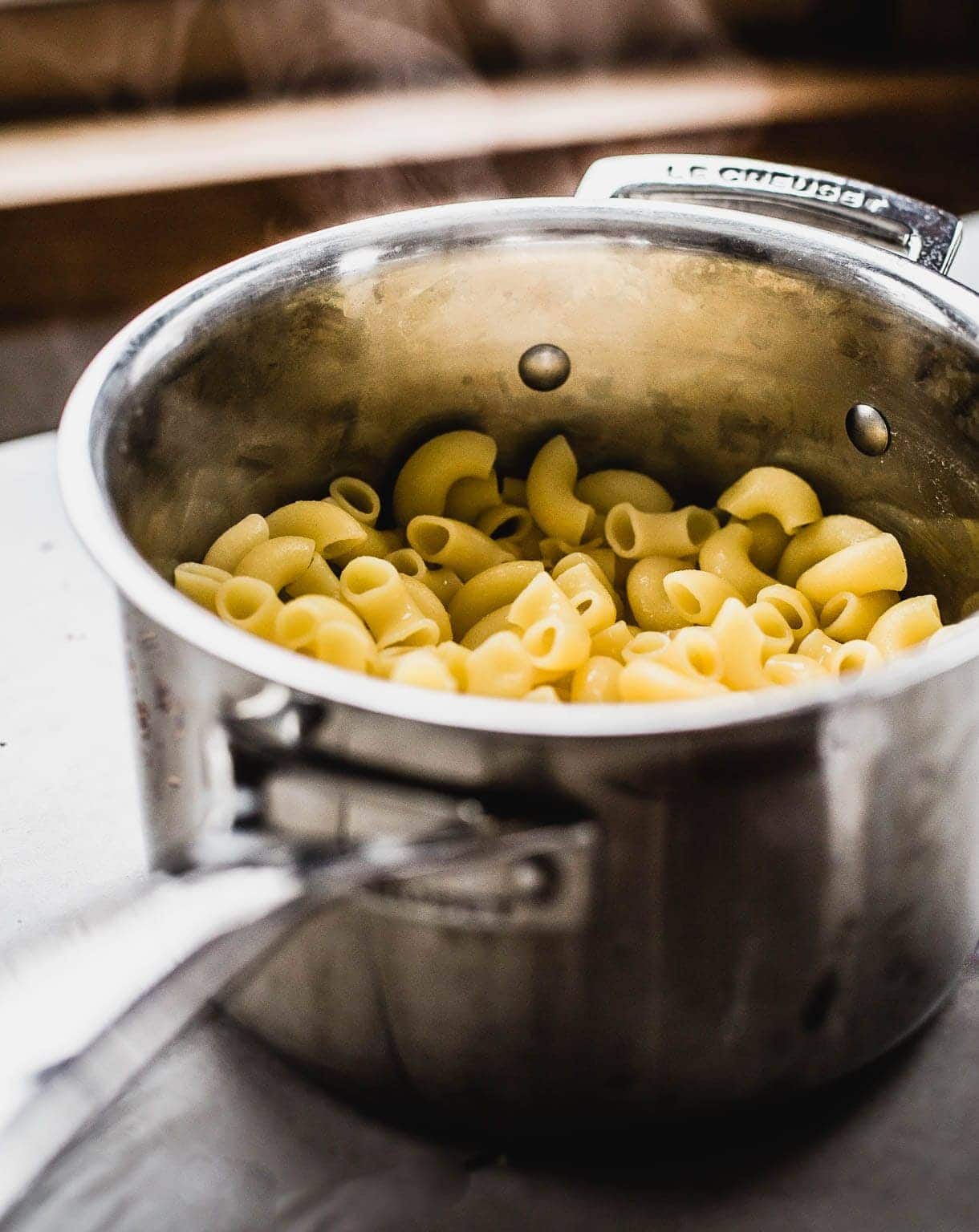macaroni noodles steaming in a pot
