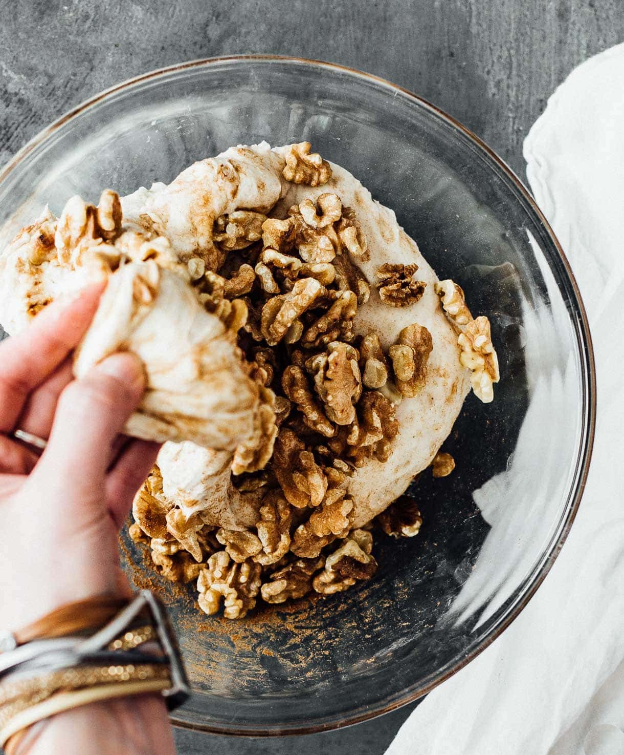 Folding walnuts into sourdough bread