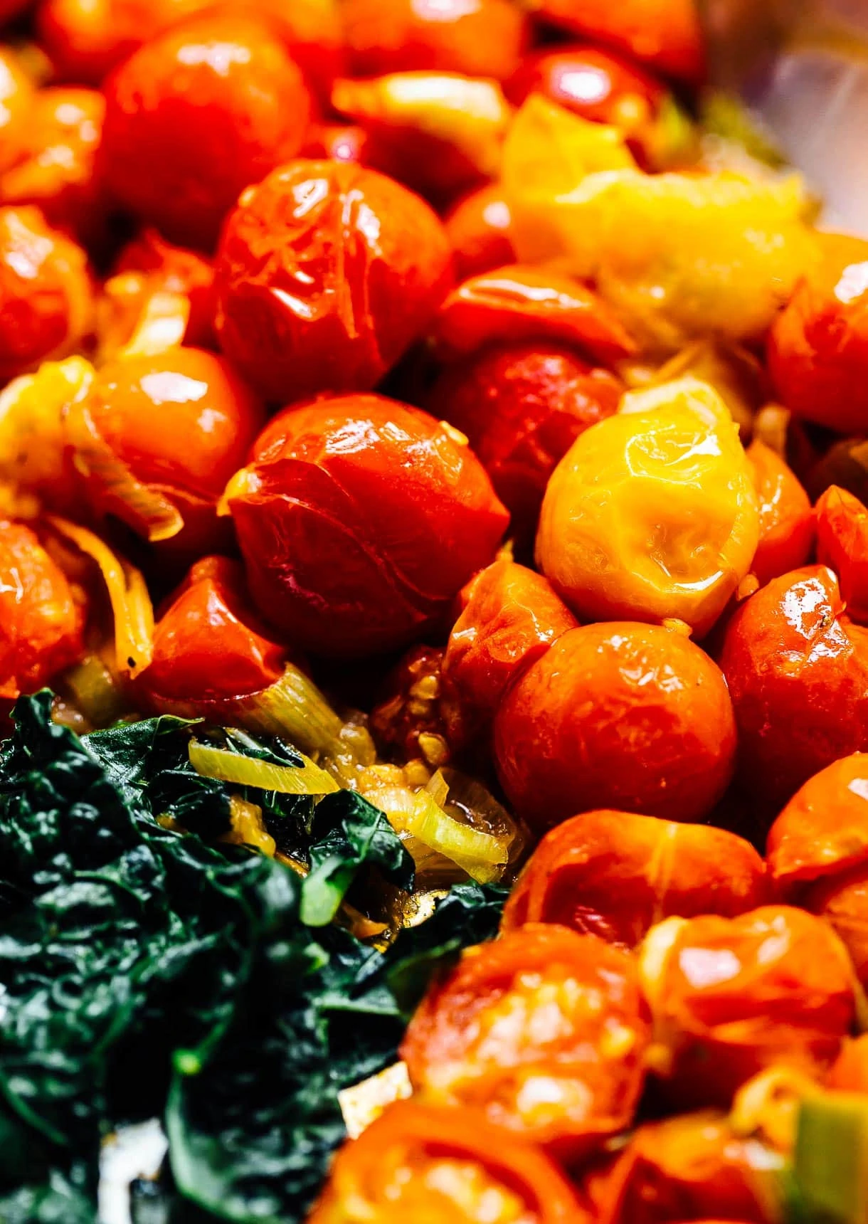 blistered cherry tomatoes with kale