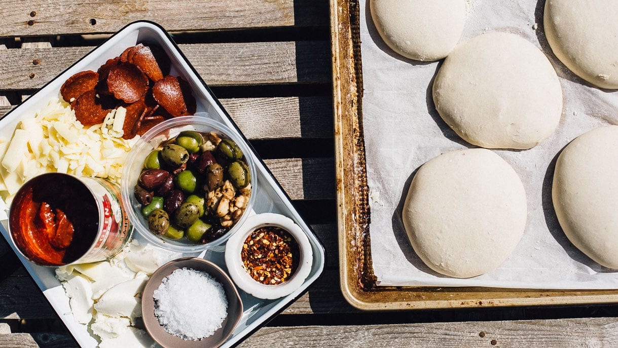 grilled sourdough pizza dough and ingredients