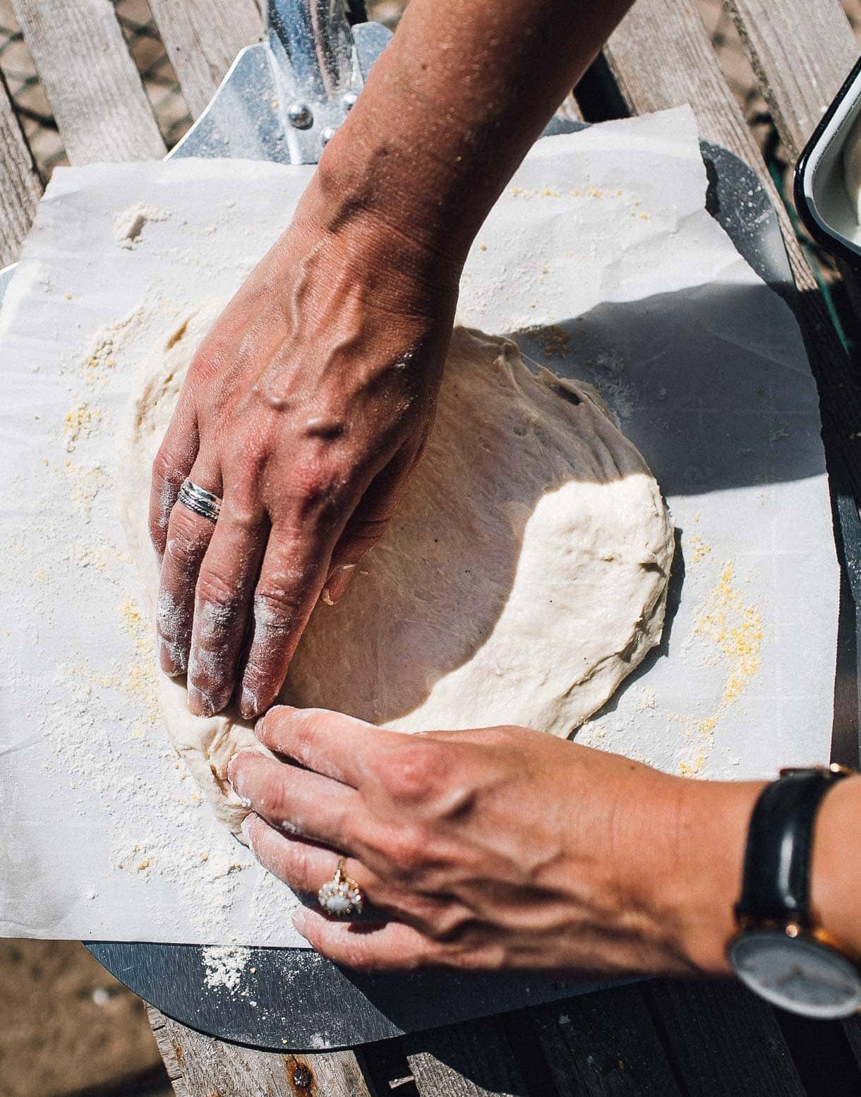 stretching sourdough pizza dough