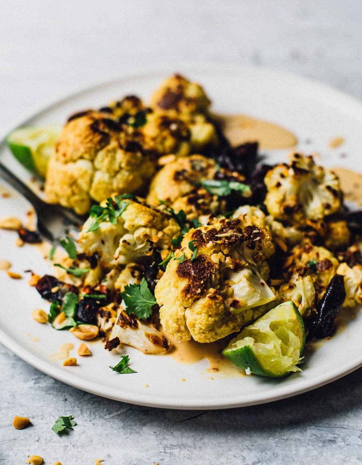 Sweet and Spicy Roasted Cauliflower with Peanut Sauce