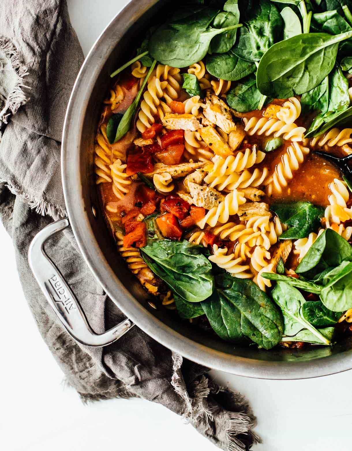 One Pot Pasta with spinach, rotini noodles, tomatoes, turkey