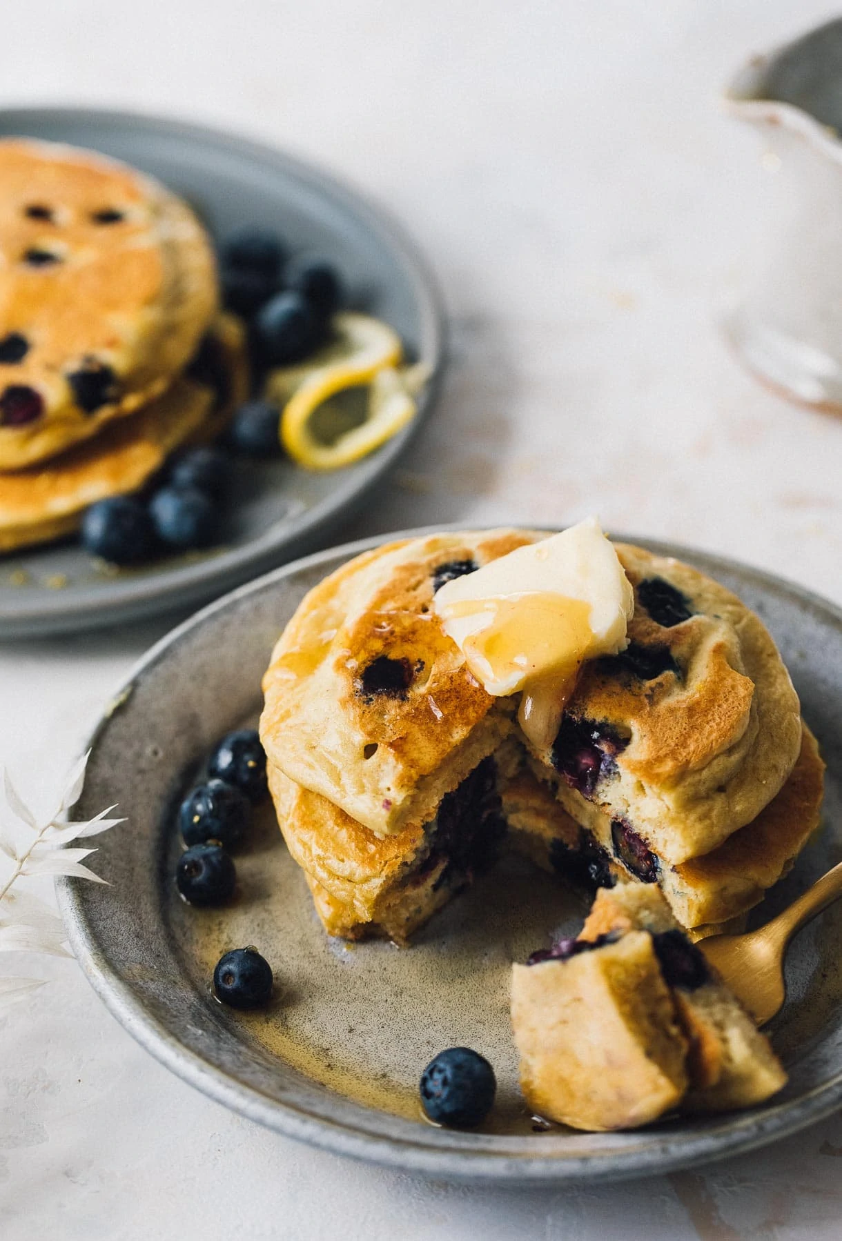 a stack of blueberry pancakes