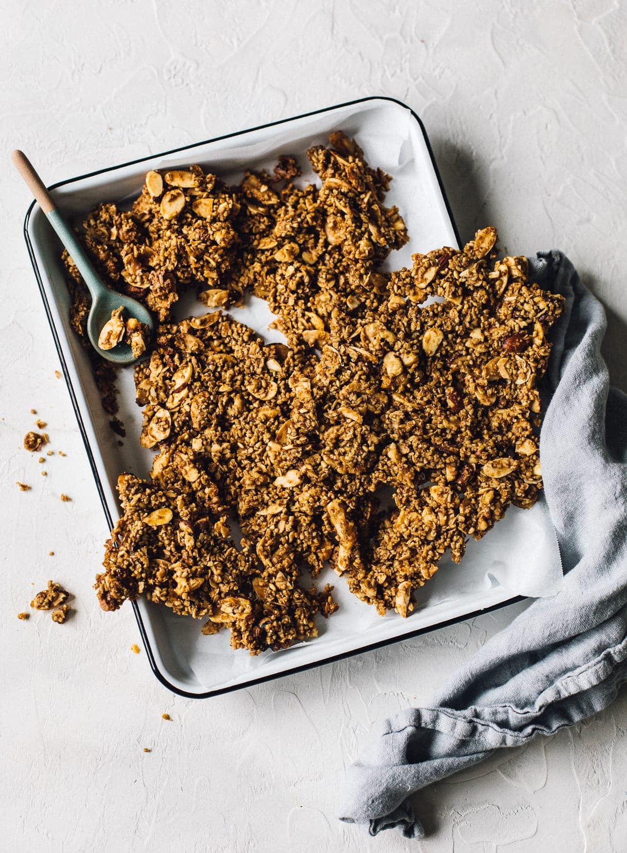 chunky vegan granola in an enamel pan