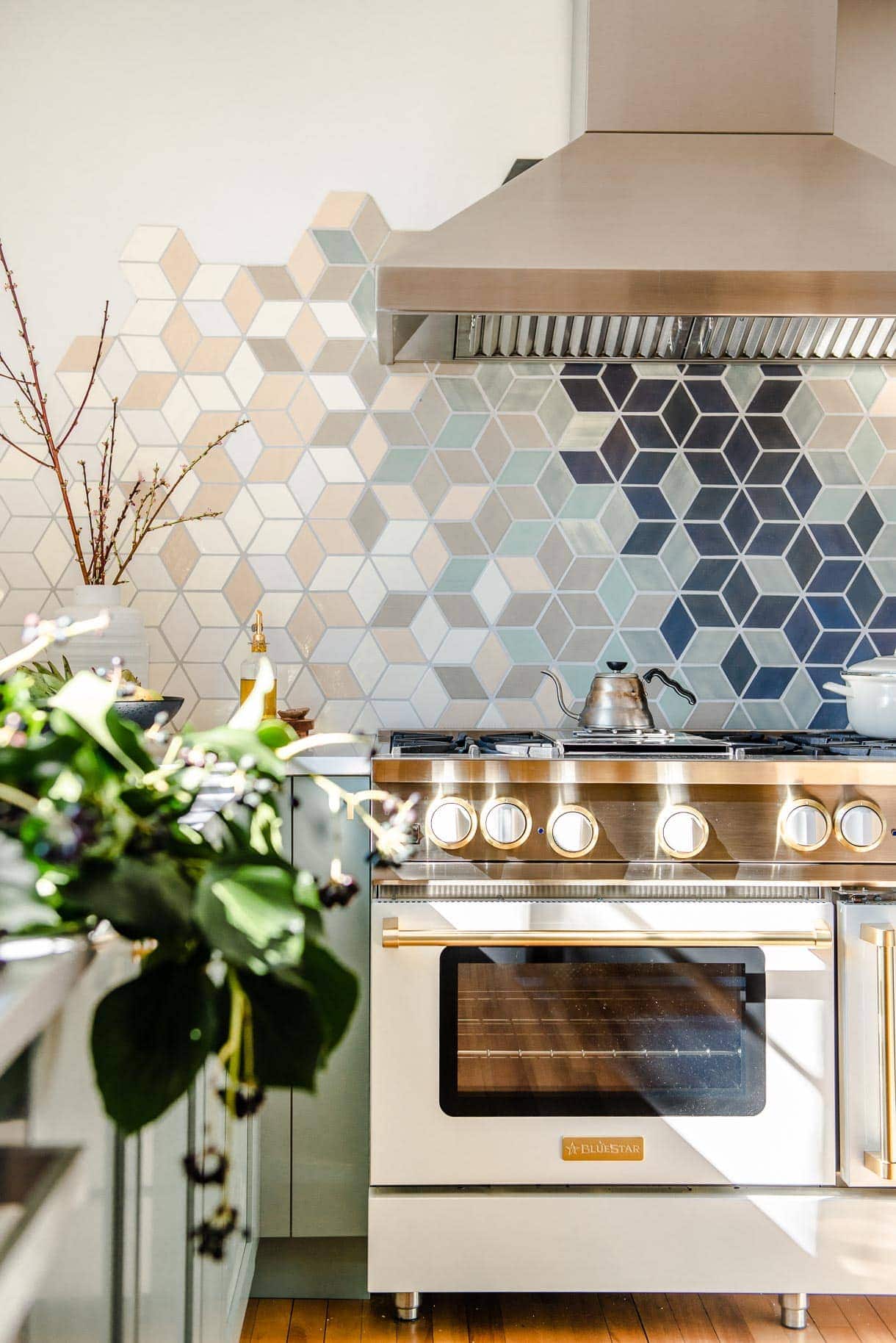 modern u-shaped kitchen with white walls, frameless window, open shelving