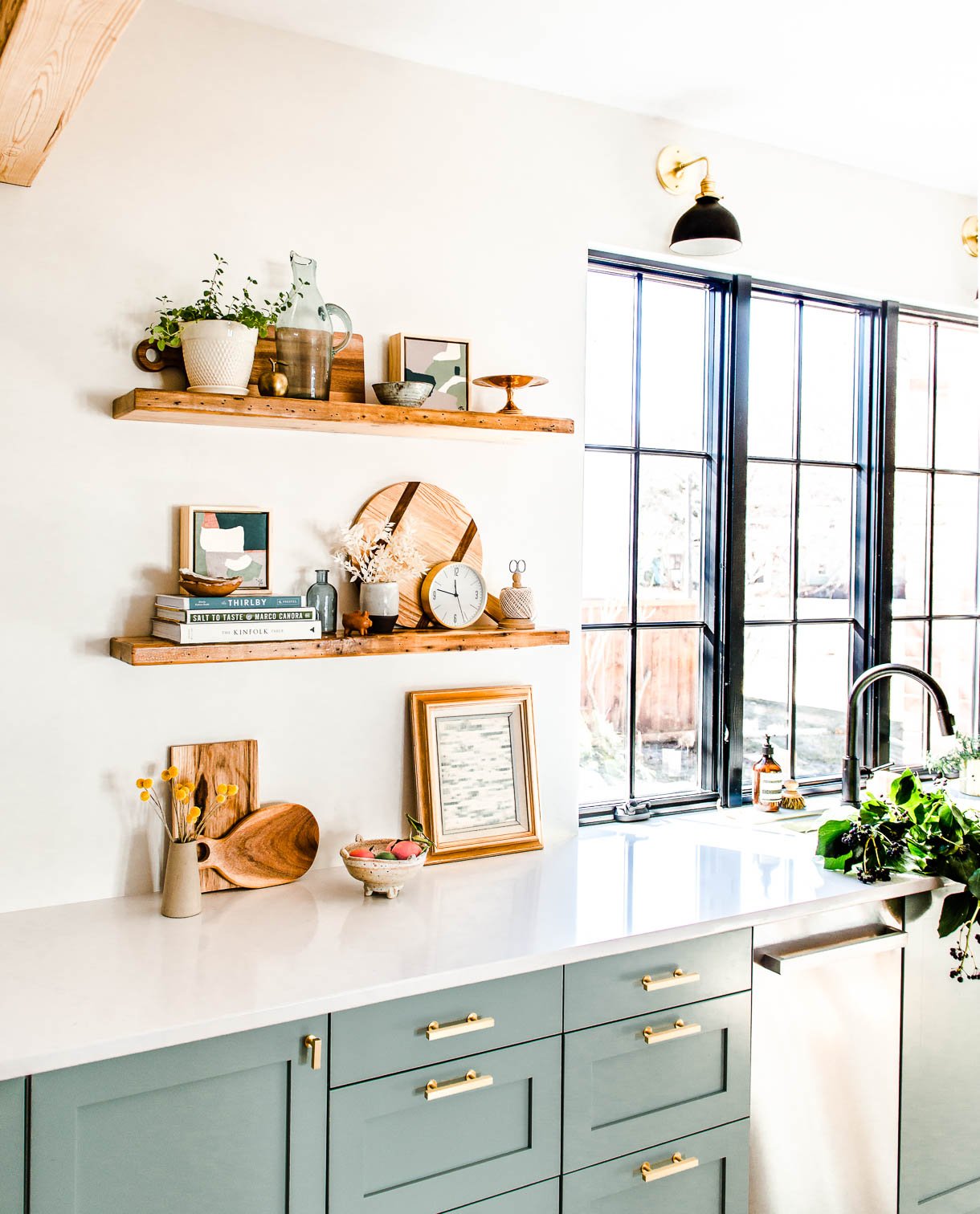 reclaimed wood shelves near frameless window in kitchen