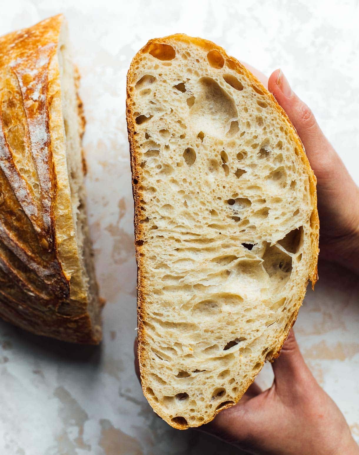 crumb shot of sourdough bread, holding in hands