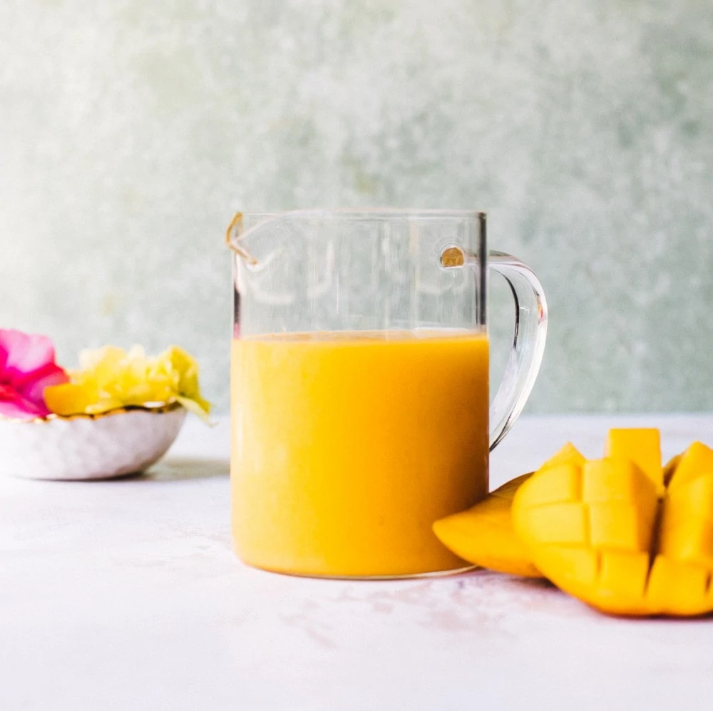 mango puree in a glass beaker