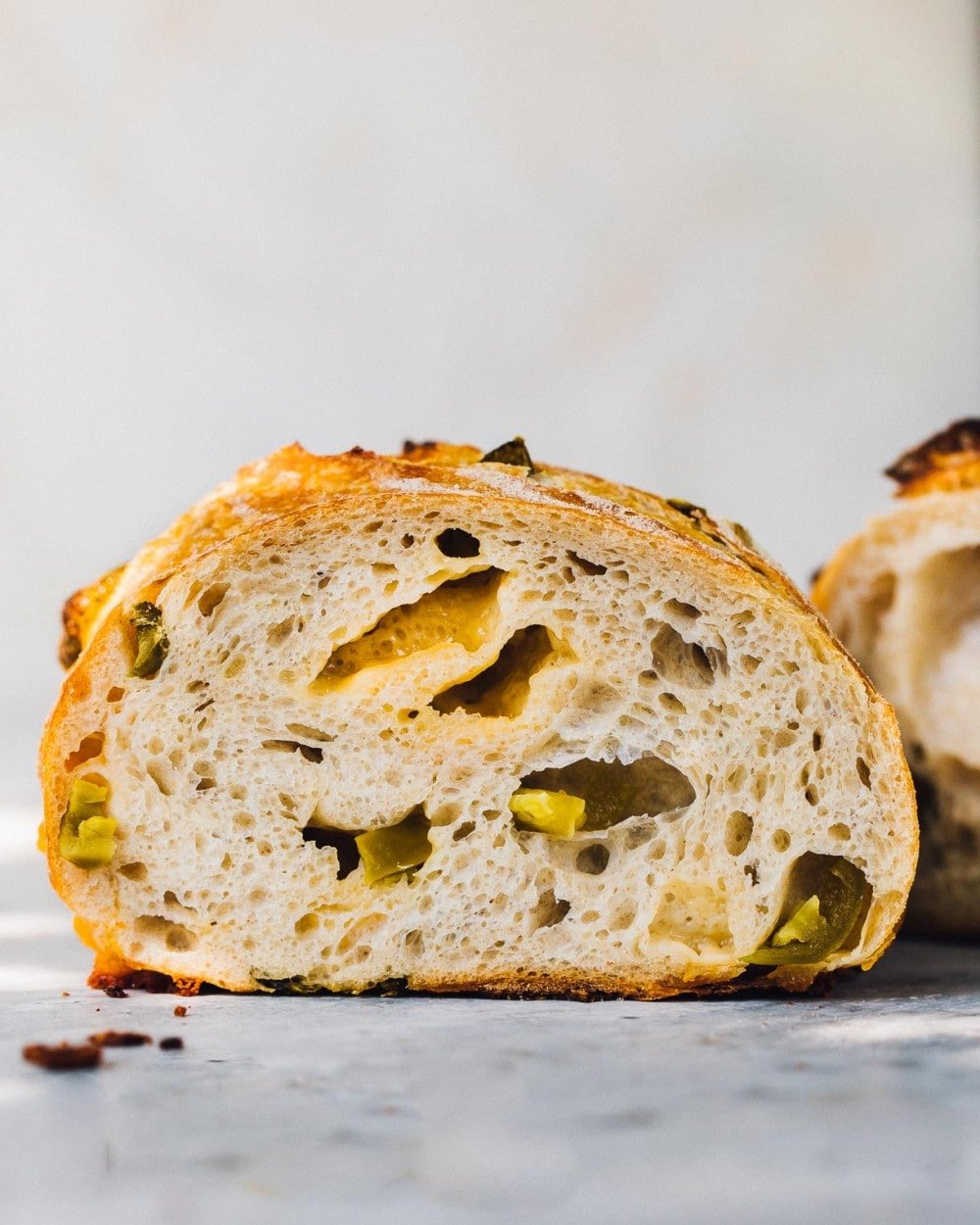 cross section of a loaf of cheese and jalapeno sourdough