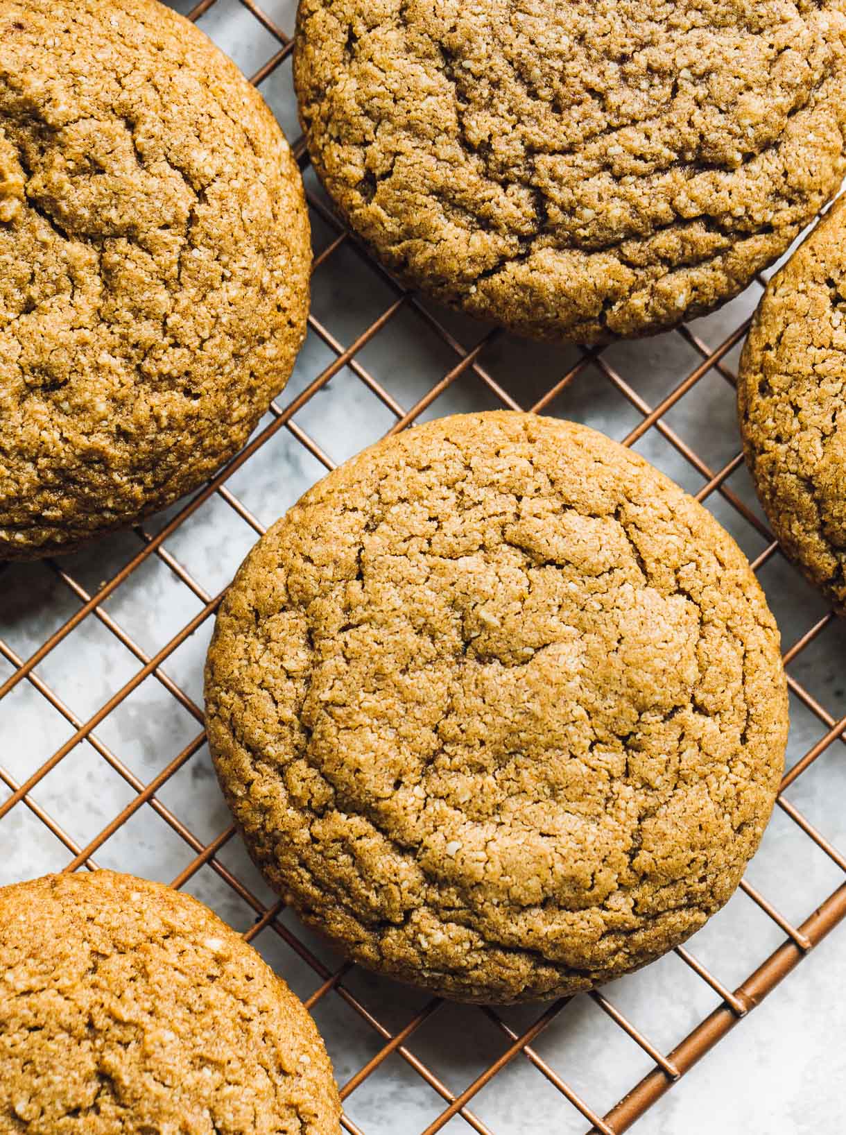 pumpkin cookies on a copper cooling rack