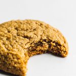 gluten free pumpkin cookie with a bite taken out of it.