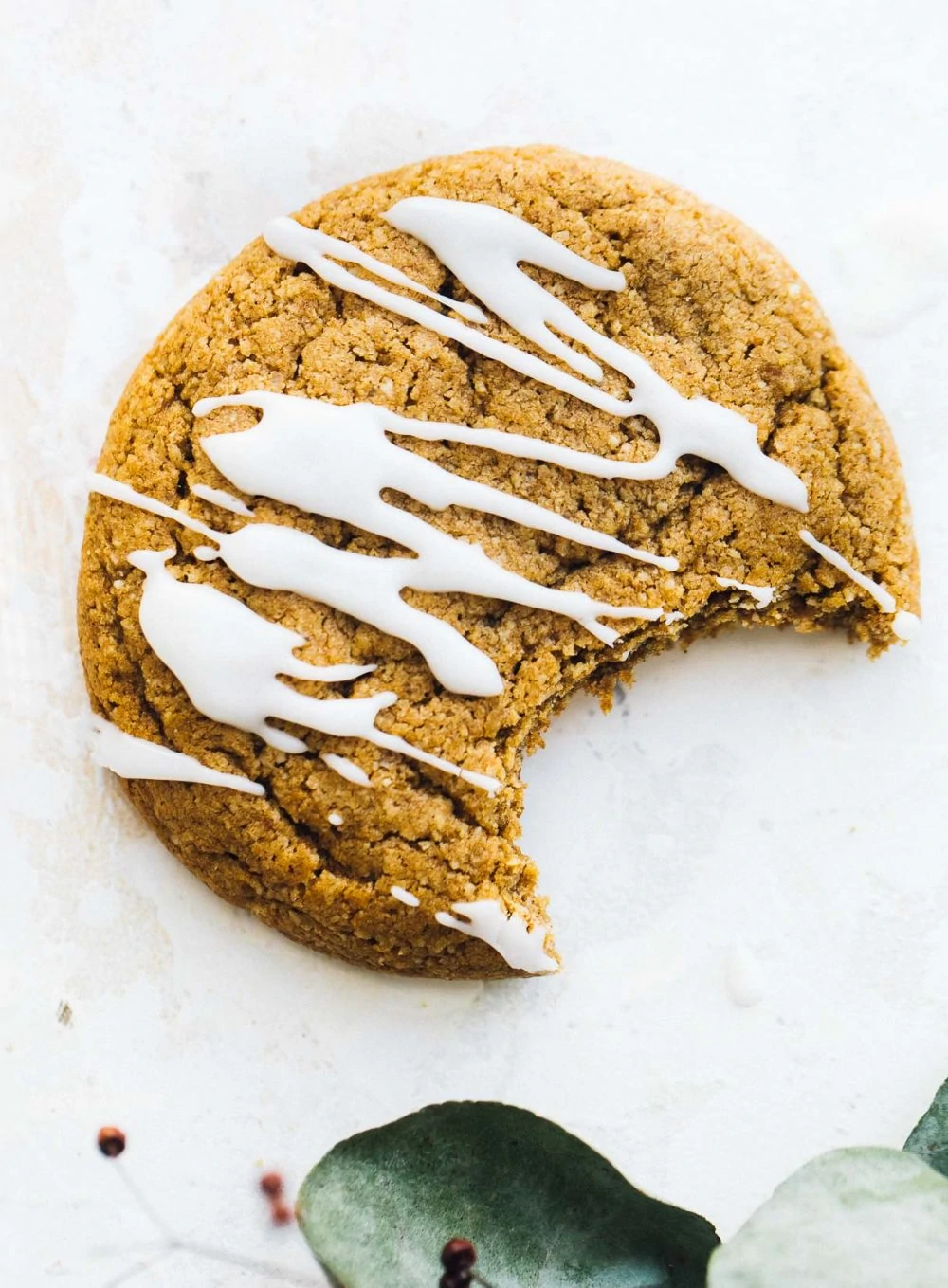 gluten-free pumpkin cookie with bite taken out of it