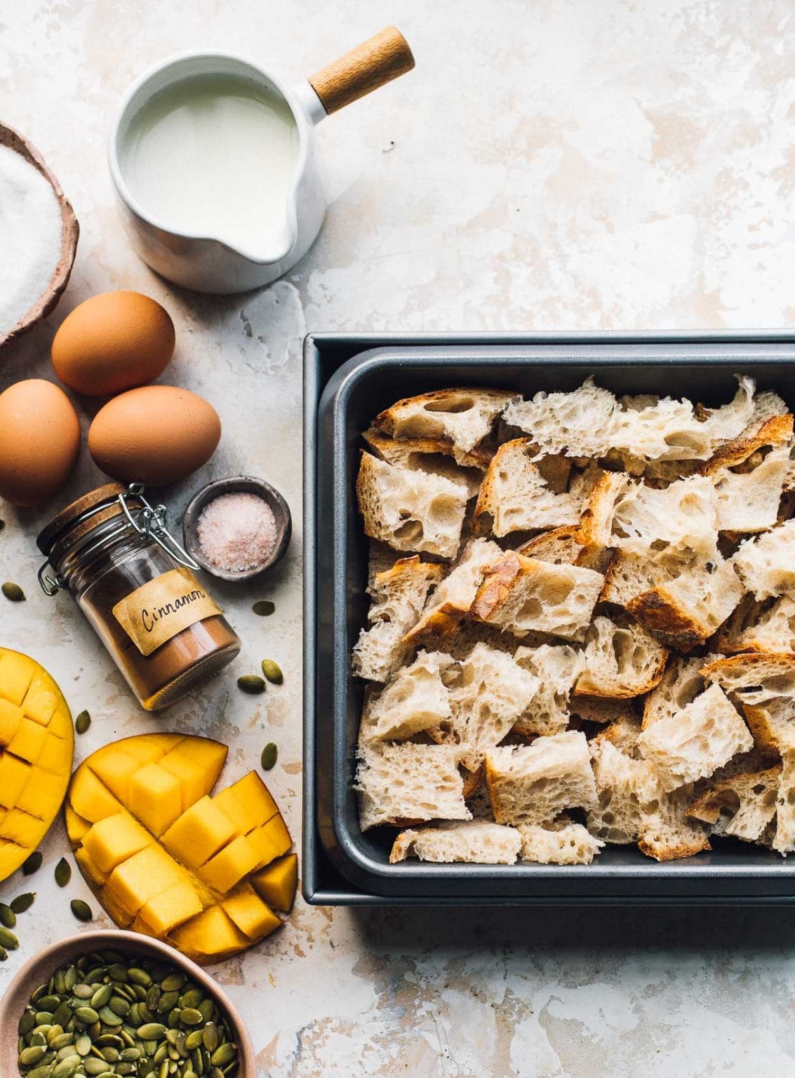Sourdough Bread Pudding with Mango and Pepitas • Heartbeet Kitchen