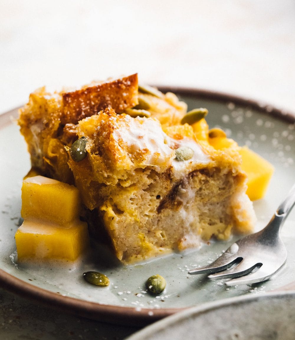 mango bread pudding on a plate