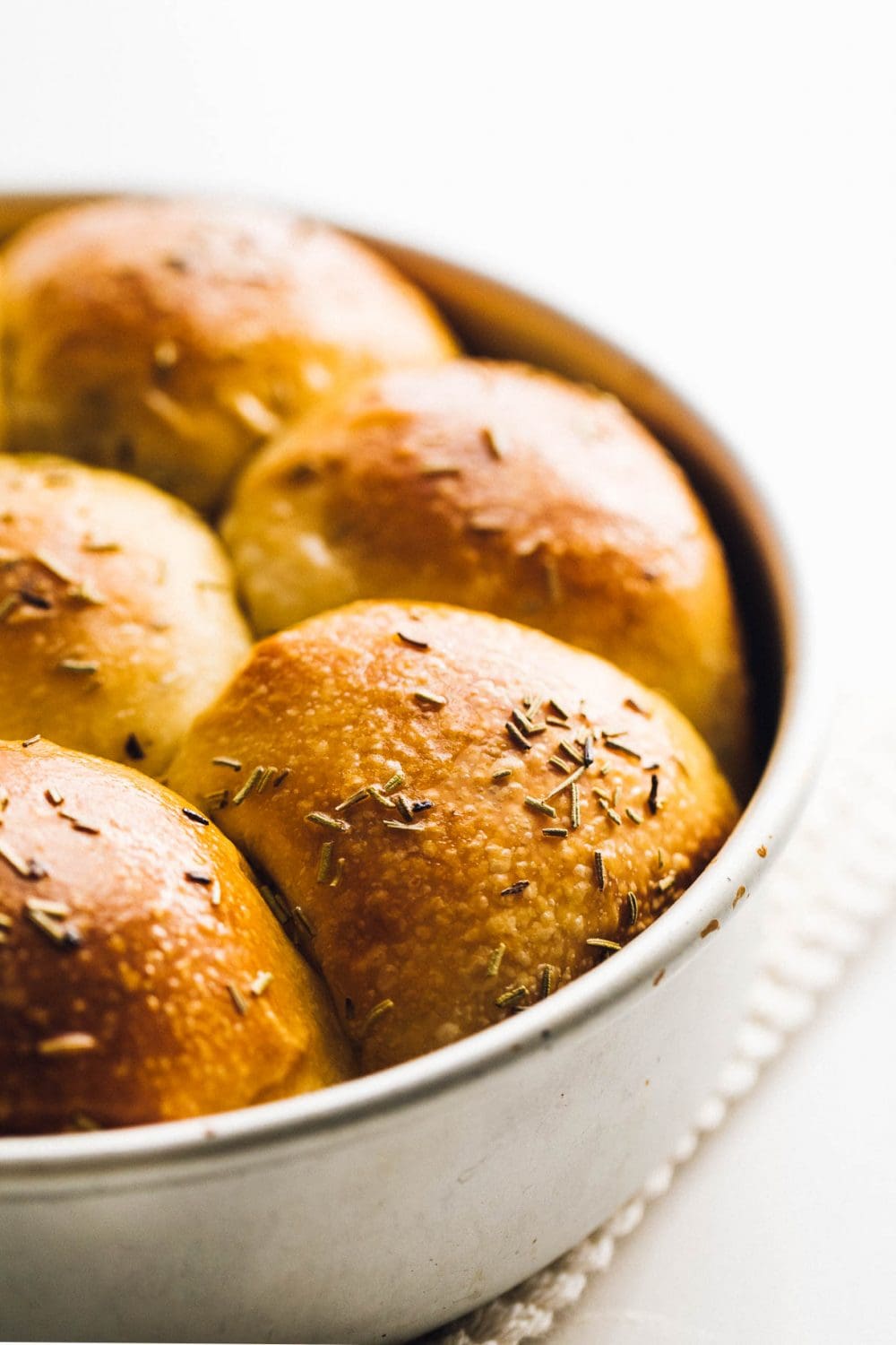 sourdough dinner rolls close up photo, in aluminum pan