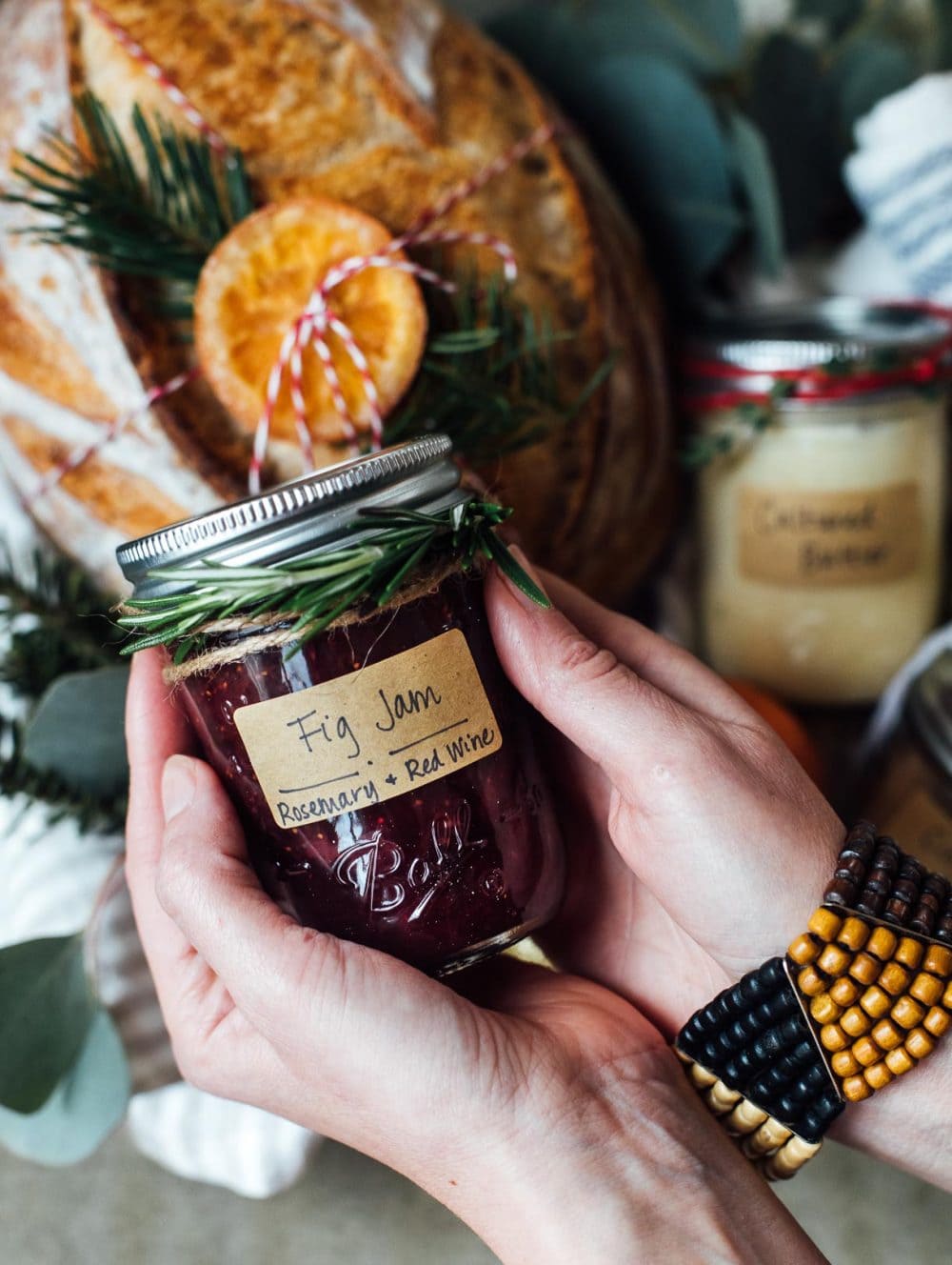 holding jar of fig jam