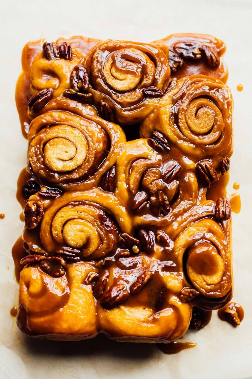 sourdough sticky buns with pecans that have been removed from their pan.