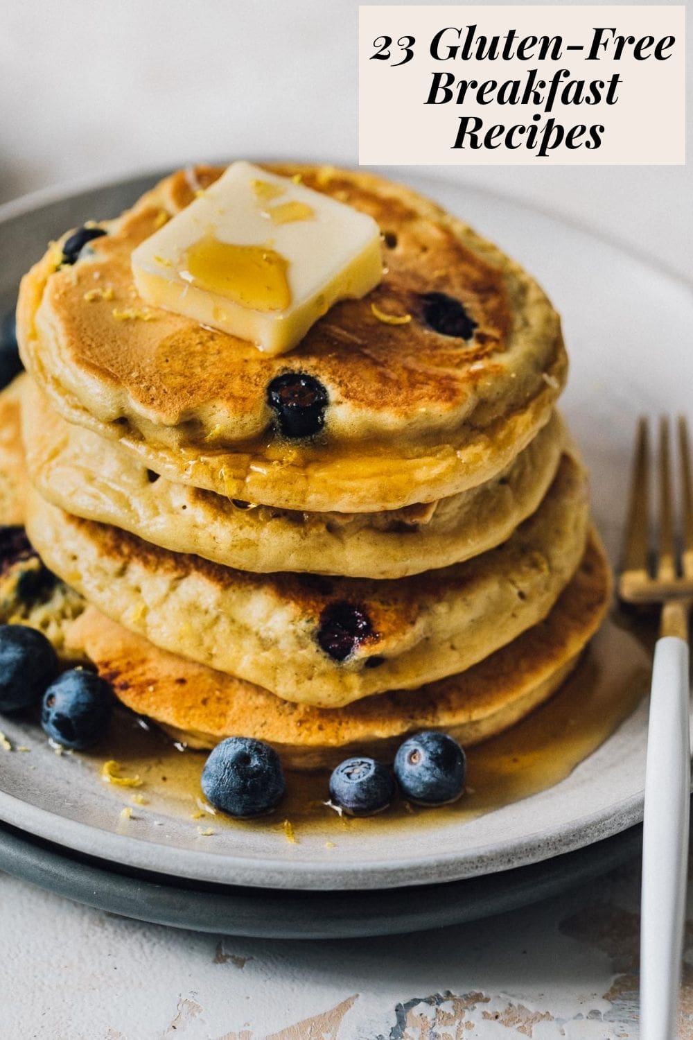 gluten-free blueberry panckaes on light blue plate