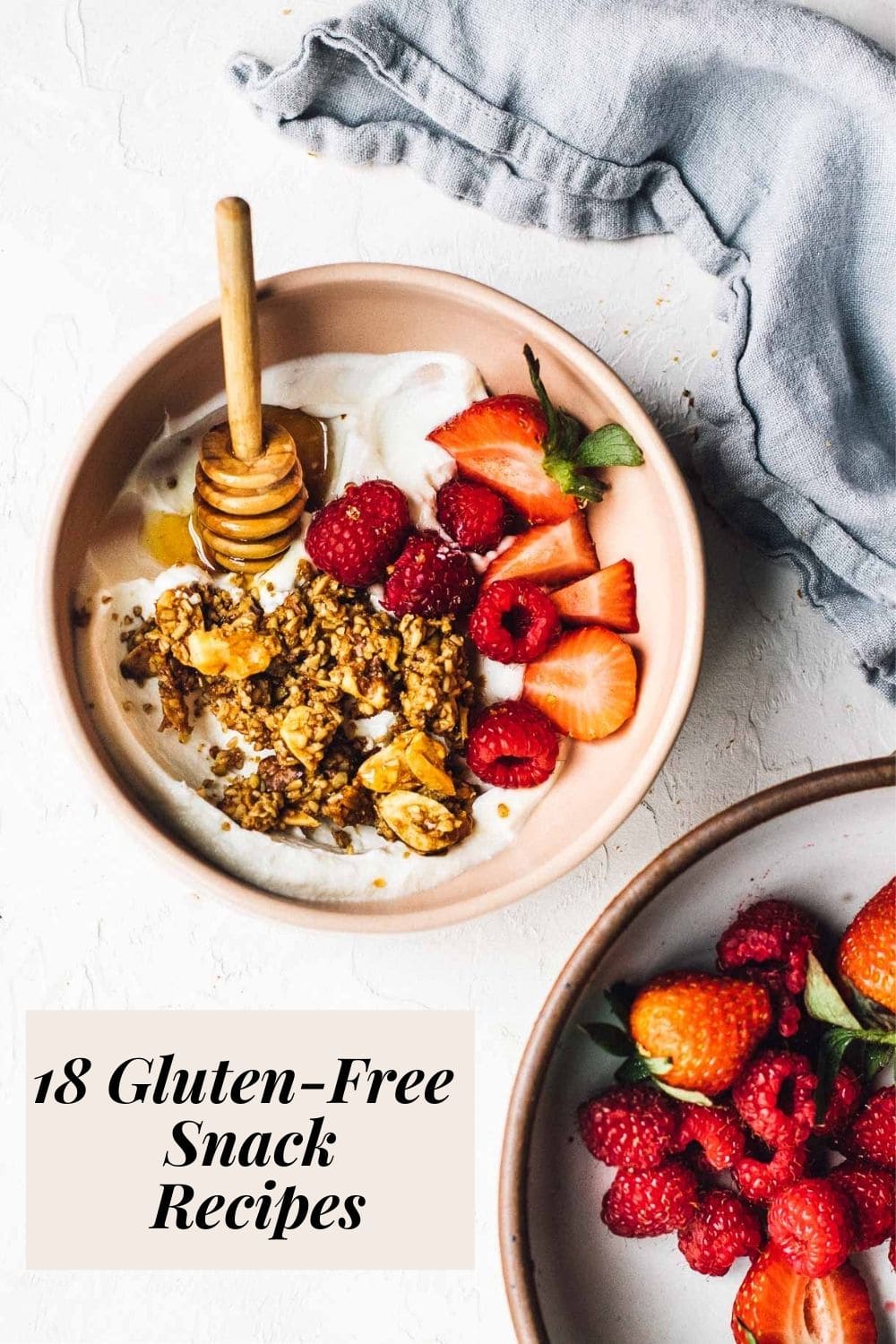 gluten free granola in a pink bowl with berries