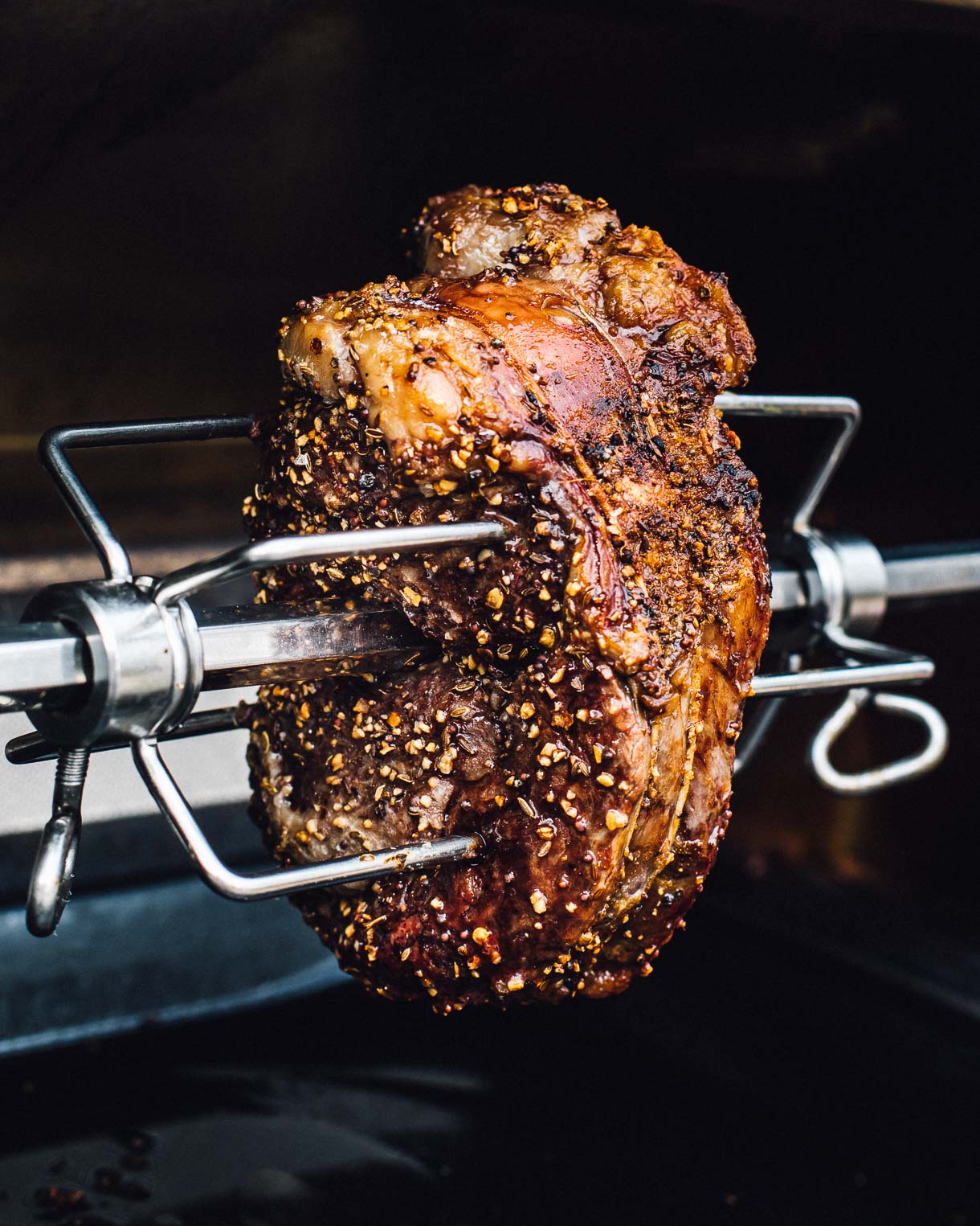 rotisserie prime rib spinning on grill