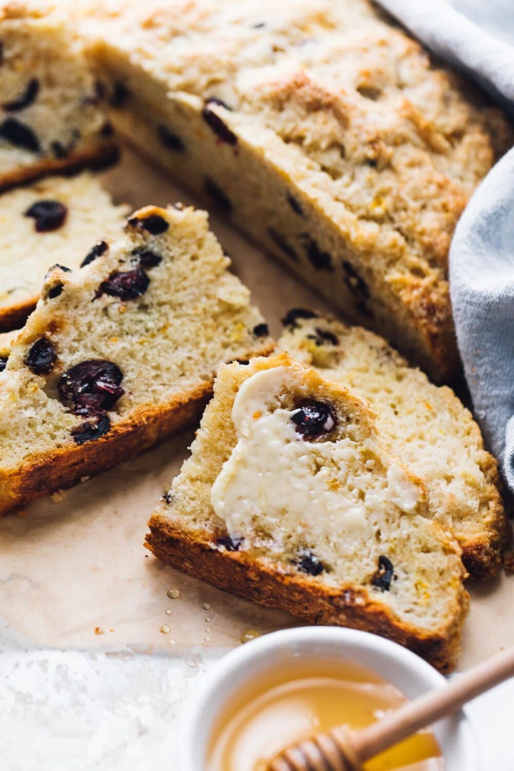 sourdough discard soda bread slices with honey and butter