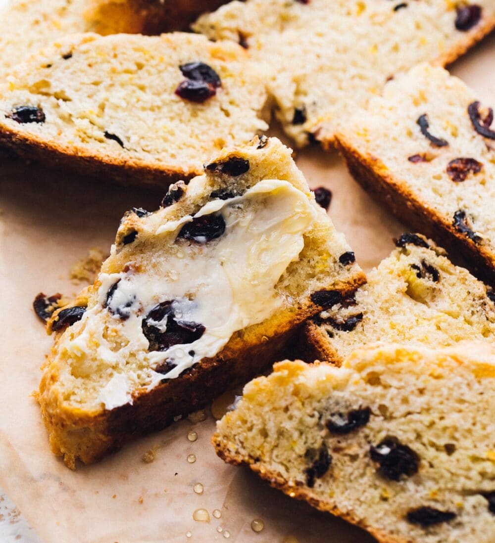 sourdough soda bread with butter and honey slathered on the slice