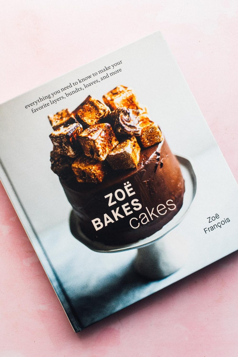 zoe bakes cake cookbook on pink background