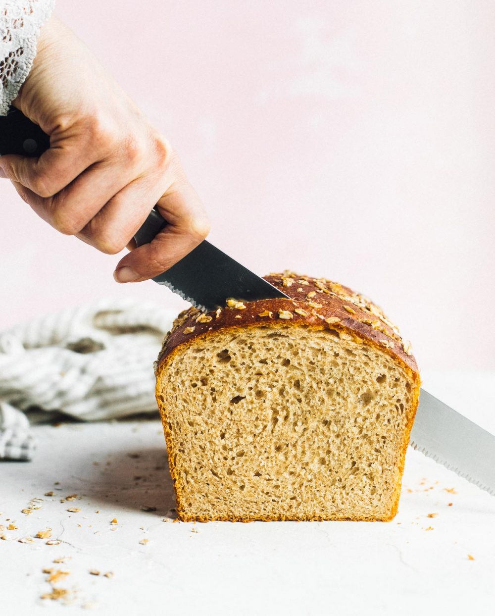 cutting whole wheat sourdough sandwich bread